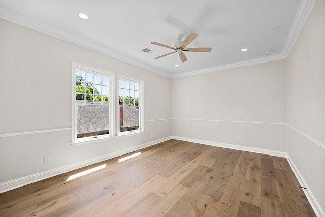 unfurnished room featuring ornamental molding, light hardwood / wood-style floors, and ceiling fan