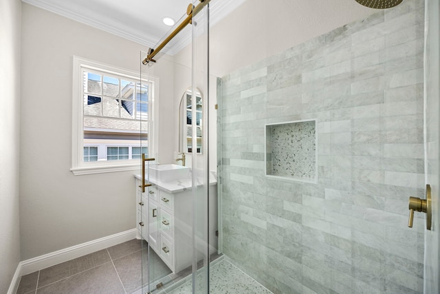 bathroom featuring vanity, ornamental molding, a shower with shower door, and tile patterned flooring