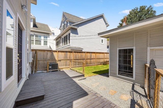 wooden terrace featuring central air condition unit