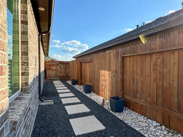 18310 Grayson Bluff Way, Richmond, TX 77407 - view of yard featuring fence and a gate