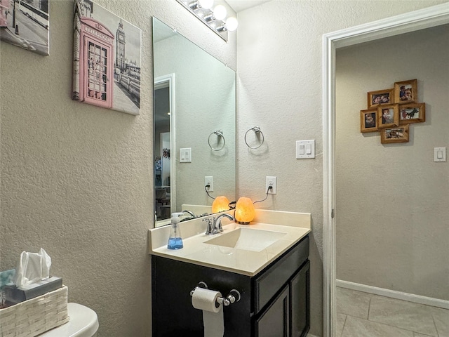 18310 Grayson Bluff Way, Richmond, TX 77407 - half bathroom with vanity, tile patterned floors, and toilet