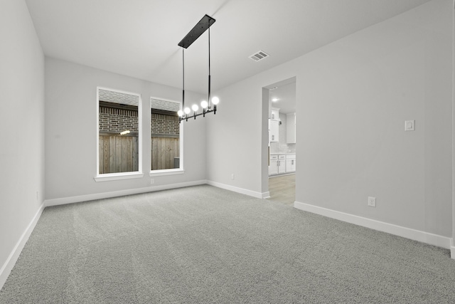 unfurnished dining area with light carpet, baseboards, and visible vents