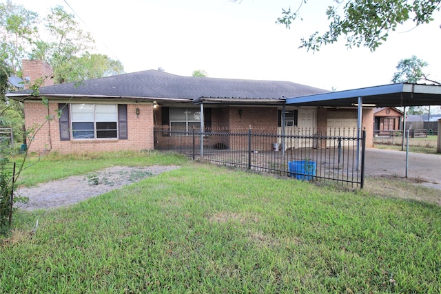 ranch-style home with a carport and a front yard