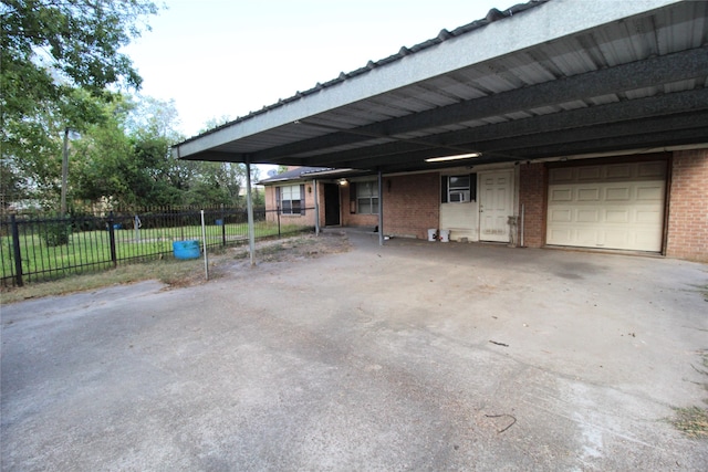 garage with a carport