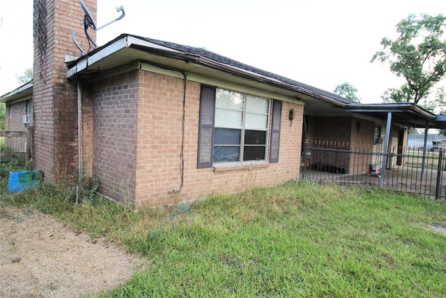 view of property exterior with a yard