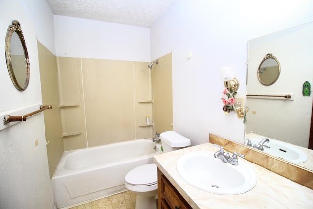 full bathroom featuring vanity, toilet,  shower combination, and a textured ceiling