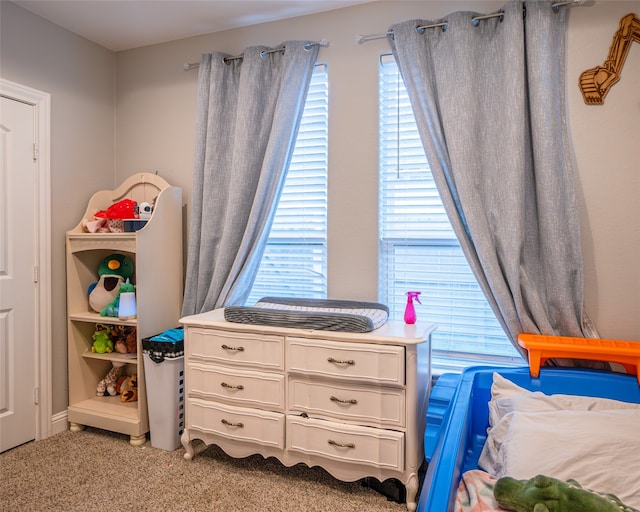 bedroom with light carpet