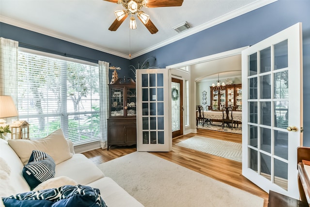 interior space featuring hardwood / wood-style floors, french doors, and plenty of natural light