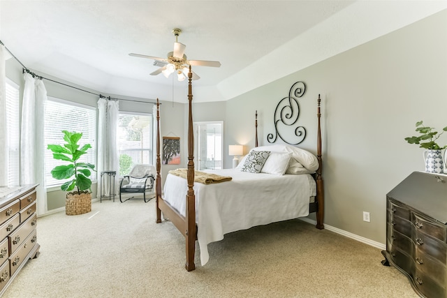 bedroom featuring ceiling fan and light colored carpet