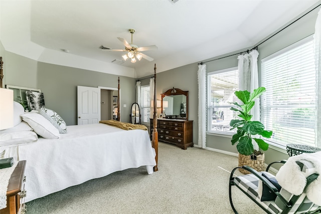 bedroom featuring light carpet and ceiling fan