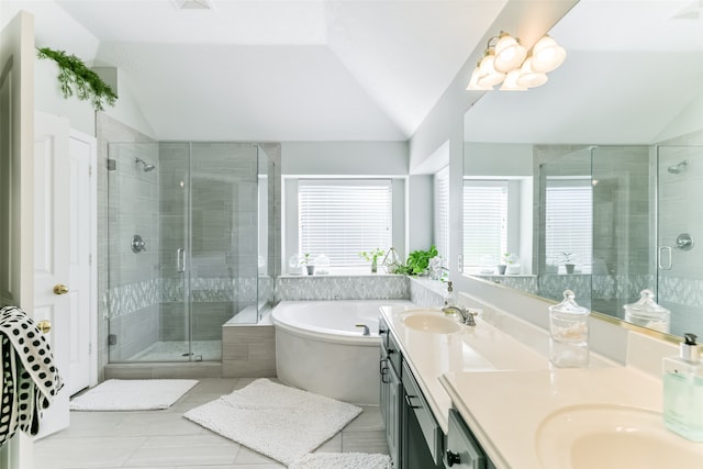 bathroom with vanity, lofted ceiling, shower with separate bathtub, and tile patterned flooring