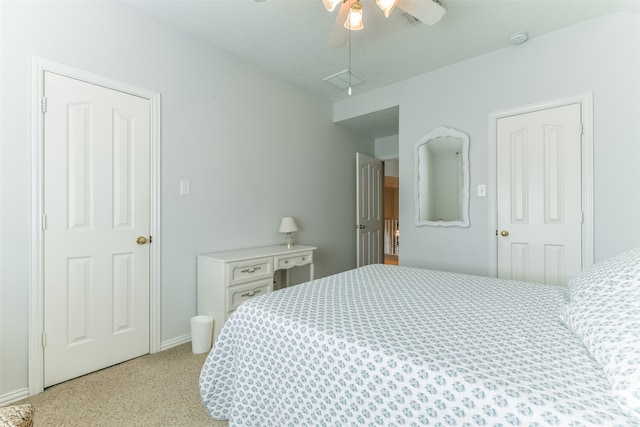 carpeted bedroom with ceiling fan