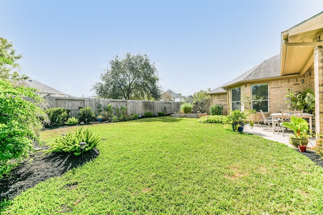 view of yard with a patio area