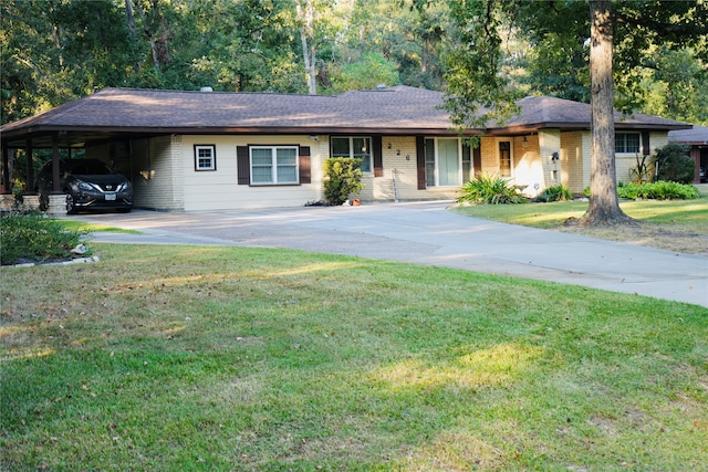 single story home with a front lawn and a carport