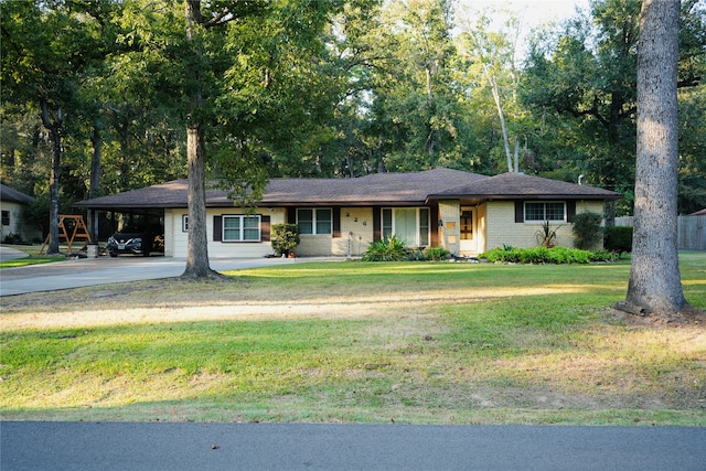 ranch-style home featuring a front yard