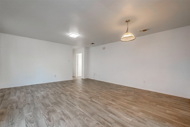 empty room featuring light hardwood / wood-style floors