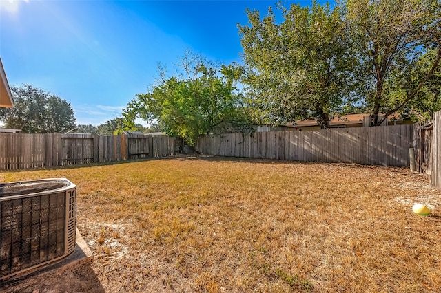 view of yard with central AC unit