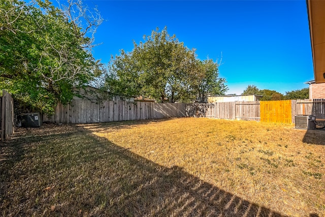 view of yard with central AC