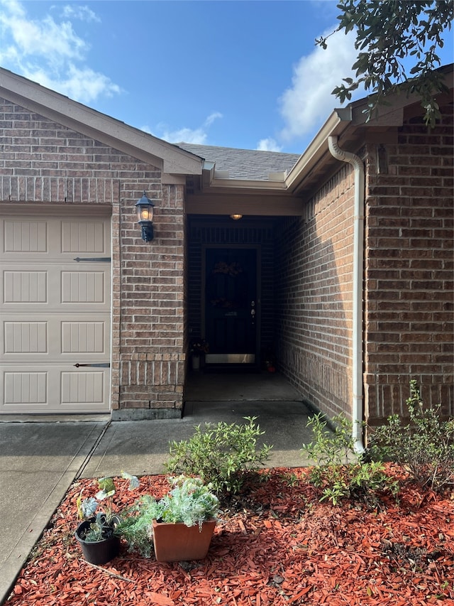 entrance to property with a garage