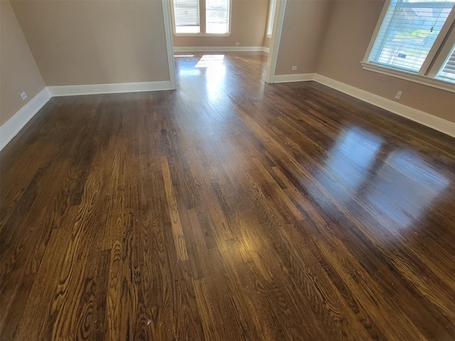 2601 Wheeler St, Houston, TX 77004 - spare room featuring dark wood-style flooring and baseboards