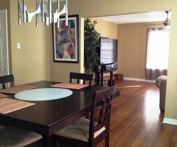 2601 Wheeler St, Houston, TX 77004 - dining area featuring wood finished floors and baseboards