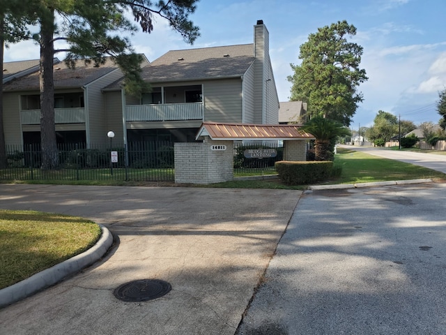 exterior space featuring a balcony