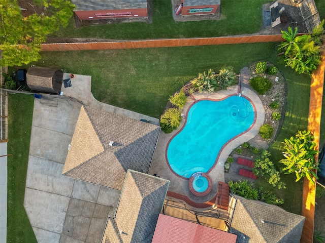 view of swimming pool with a patio and a lawn