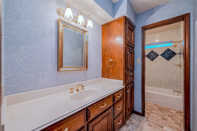 bathroom with vanity and bathtub / shower combination