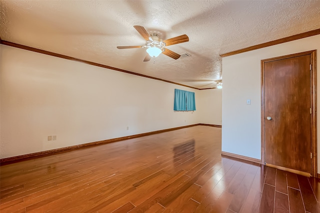 unfurnished room featuring hardwood / wood-style floors, a textured ceiling, and ceiling fan