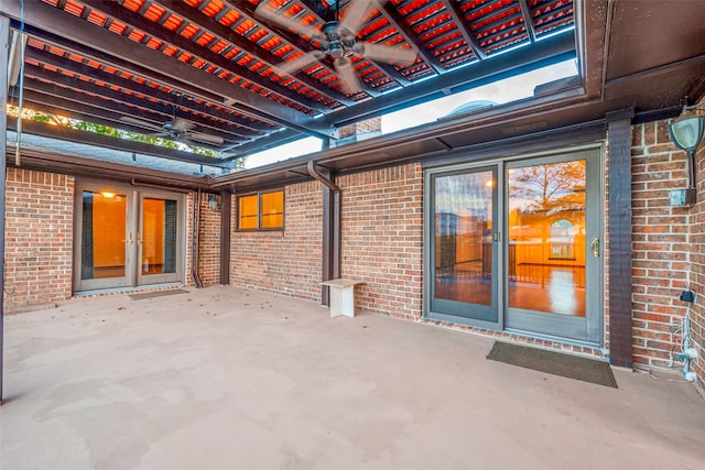 view of patio / terrace featuring ceiling fan