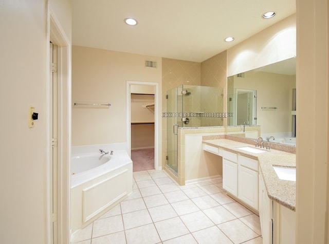 bathroom with vanity, separate shower and tub, and tile patterned flooring