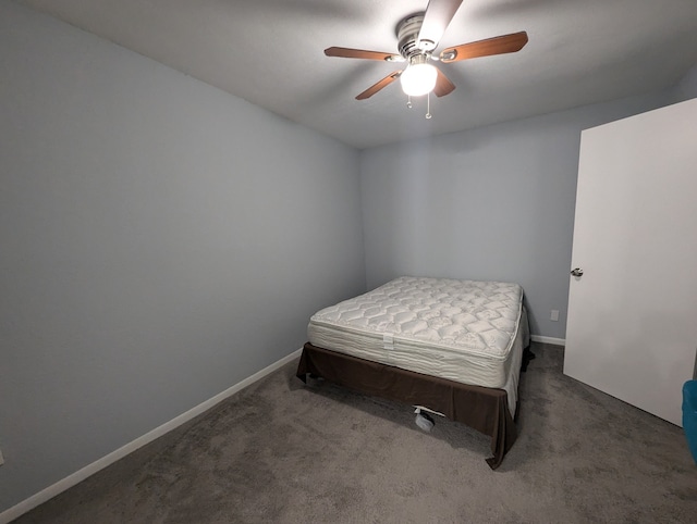 bedroom with dark carpet and ceiling fan