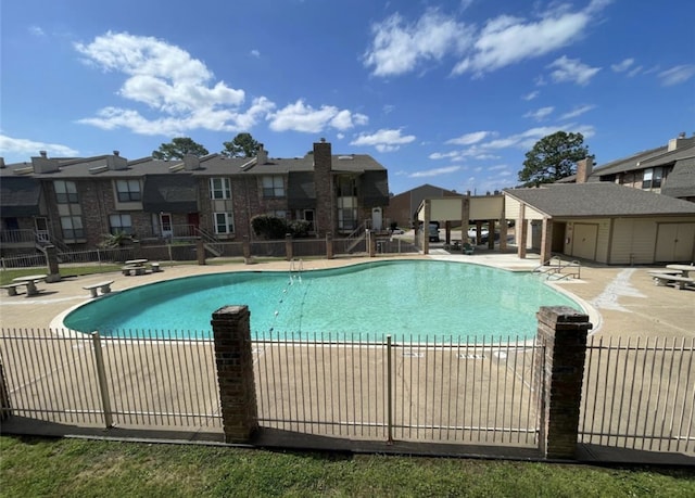 view of swimming pool featuring a patio