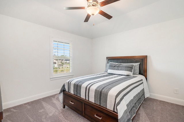 bedroom featuring light carpet and ceiling fan