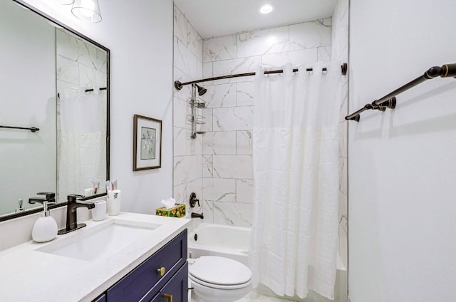 full bathroom featuring vanity, shower / tub combo with curtain, and toilet