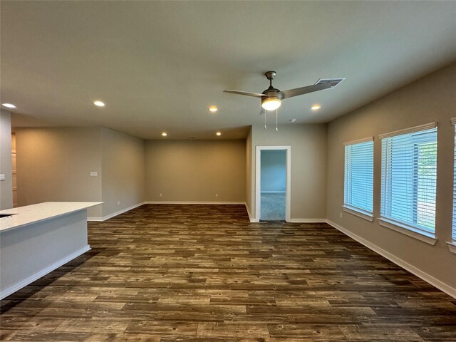 12287 Council Grove Dr, Conroe, TX 77384 - empty room featuring baseboards, dark wood-style flooring, a ceiling fan, and recessed lighting