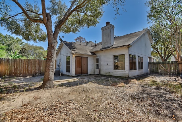 back of house with a patio area