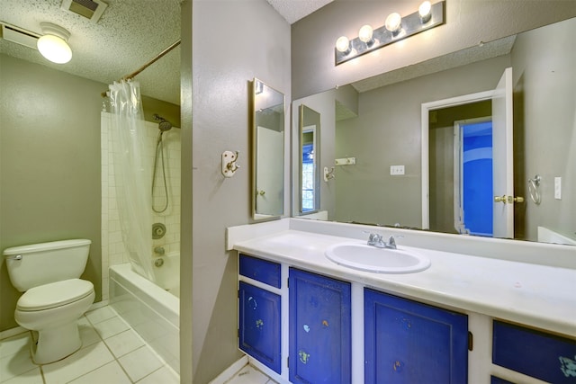 full bathroom featuring toilet, tile patterned flooring, vanity, a textured ceiling, and shower / bathtub combination with curtain