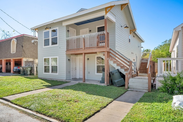 view of front of home with a front lawn