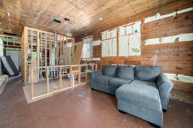 living room featuring wood walls and wooden ceiling