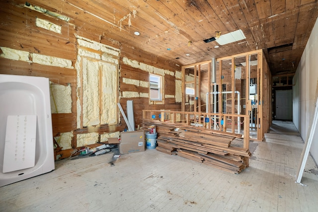 miscellaneous room with wooden walls and wooden ceiling