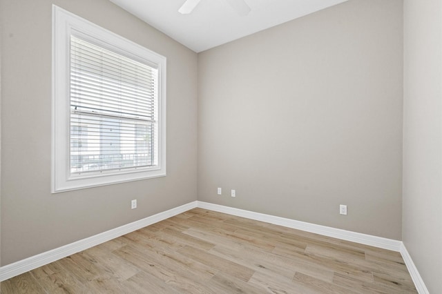 168 Lake Point Blvd Unit C202, Conroe, TX 77356 - spare room with light wood-type flooring and a ceiling fan