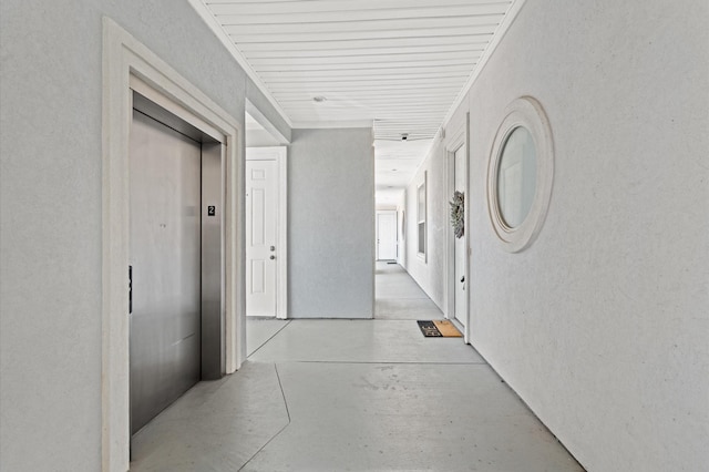 168 Lake Point Blvd Unit C202, Conroe, TX 77356 - corridor featuring elevator and finished concrete floors