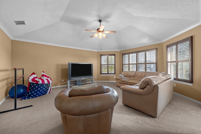 carpeted living room featuring ceiling fan, crown molding, a textured ceiling, and vaulted ceiling