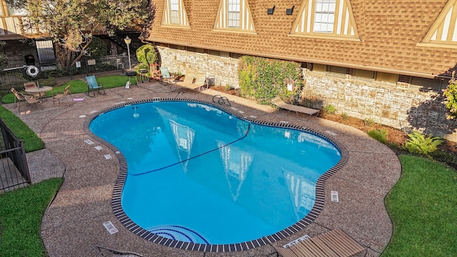 view of pool with a patio