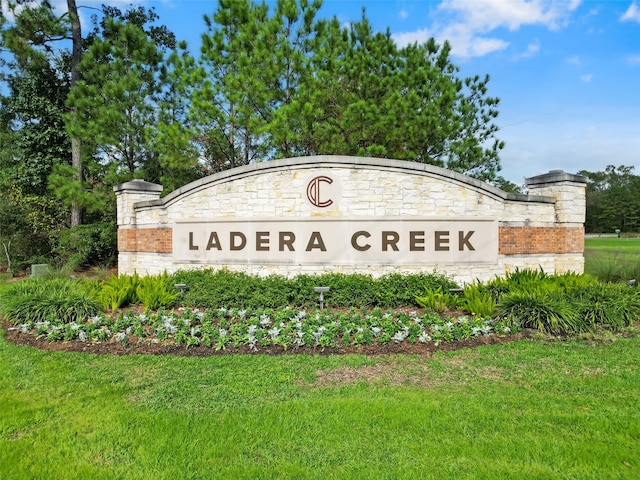 view of community sign