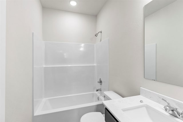 full bathroom featuring vanity, shower / bath combination, and toilet