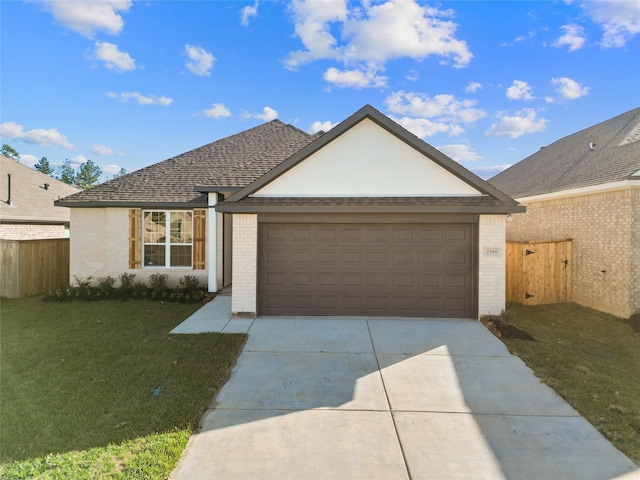 single story home with a front lawn and a garage