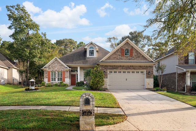 view of front of home featuring a garage, a front yard, and central AC