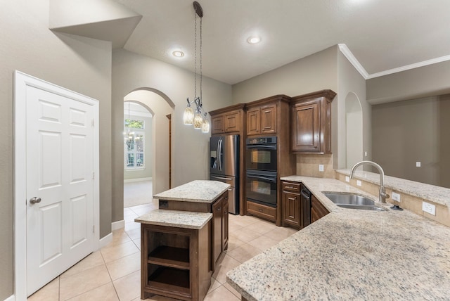 kitchen featuring black appliances, a kitchen island, sink, kitchen peninsula, and light stone counters